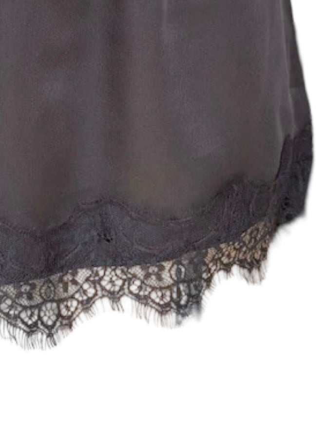 Black lace-trimmed garment on a white background